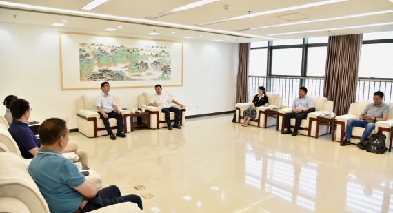 朱志骞会见广东永亮集团董事长佘永亮一行_副本.jpg